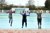 Des nageurs dans une piscine à Londres, le 29 mars 2021