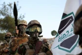 Des combatttants du groupe jihadiste  Hayat Tahrir al-Sham (HTS), le 16 août 2023 dans la province d'Idleb, en Syrie