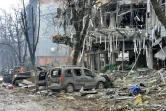 Une immeuble endommagé par des tirs d'obus à Kharkiv, la deuxième plus grande ville d'Ukraine le 3 mars 2022