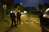 Des policiers près du lieu où le meurtrier présumé d'un enseignant a été abattu, à Eragny, le 16 octobre 2020 dans le Val-d'Oise