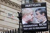 Une pancarte réclamant la démission du Premier ministre britannique Boris Johnson lors d'une manifestation devant le 10 Downing Street, le 13 avril 2022 à Londres