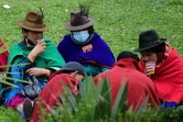 Des manifestants indigènes se reposent non loin du Parlement, à Quito le 26 juin 2022