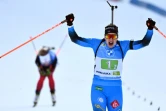La Française Julia Simon laisse éclater sa joie après avoir remporté l'épreuve du relais mixte simple (avec Antonin Guigonnat) aux Championnats du monde de biathlon, le 18 février 2021 à Pokljuka (Slovénie)
