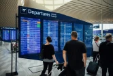 Des voyageurs au terminal 2 de l'aéroport d'Helsinki, le 19 août 2022 en Finlande