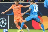 Le milieu de terrain de Lyon Houssem Aouar (g) contre Hoffenheim en Ligue des champions, le 23 octobre 2018 à Sinsheim (Allemagne) 