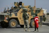 Des soldats turcs patrouillent dans la ville de Tal Abyad, dans le nord de la Syrie près de la frontière turque, le 23 octobre 2019 