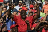 Des partisans de l'opposant vénézuélien Juan Guaido lors d'un rassemblement, le 20 février 2019 à Caracas