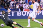 L&rsquo;attaquant Olivier Giroud marque son 2e but, et le 3e pour la France, face à la Bulgarie, lors de leur match amical, le 8 juin 2021 au Stade de France à Saint-Denis, en guise de préparation avant l&rsquo;Euro 2020