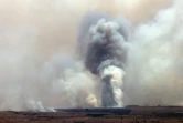 De la fumée s'élève après un tir de roquette depuis le Liban sur la Haute-Galilée, dans le nord d'Israël, le 4 juillet 2024