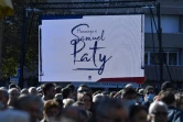 Cérémonie en mémoire de Samuel Paty au collège où il enseignait à Conflans-Saint-Honorine, le 16 octobre 2021 près de Paris