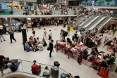 Des passagers à la gare Montparnasse à Paris le 26 juillet 2024