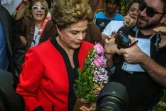 L'ex présidente brésilienne Dilma Rousseff, du parti des Travailleurs (PT, gauche) arrive dans son bureau de vote à Porto Alegre, lors des élections municipales le 2 octobre 2016