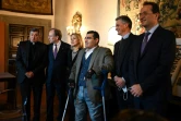 L'athlète libanais paraplégique Michael Haddad (C), lors d'une conférence de presse à Rome le 17 décembre 2021