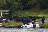 Des policiers arrivent sur l'île d'Utoya où des personnes se mises à couvert pendant une fusillade, le 22 juillet 2011 en Norvège 