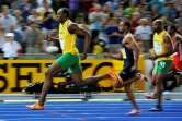 Usan Bolt devant Tyson Gay et Asafa Powell lors du 100 m lors des Mondiaux de Berlin, le 16 août 2009