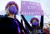 Des militantes Femen partipent à une manifestation en faveur des droits des femmes place de la République à Paris, le 7 mars 2021 