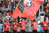 La joie de l'attaquant Martin Terrier (c), félicité par ses coéquipiers, après avoir marqué le 2e but rennais à domicile face à Lorient, lors de la 34e journée de Ligue 1, le 24 avril 2022 au Roazhon Park