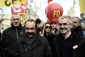 Philippe Martinez et Yves Veyrier lors d'une manifestation contre la réforme des retraites le 19 mars 2019 à Paris
