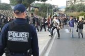 Un policier surveille une manifestation à Ajaccio le 27 décembre 2015