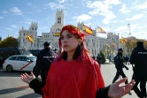 Une activiste du mouvement Extinction Rebellion sur la place de Cibeles à Madrid, le 3 décembre 2019