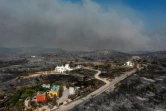 Vue aérienne des environs carbonisés du village de Kiotari, sur l'île de Rhodes, en Grèce, le 24 juillet 2023