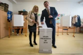 Le candidat à la présidentielle Maros Sefcovic et sa femme votent, le 16 mars 2019 à Bratislava, en Slovaquie