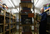 Le collectionneur Tom Werneck pose dans les archives Bayerisches Spielearchiv des jeux de société, à Munich (sud de l'Allemagne), le 12 décembre 2018