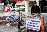 Des vendeurs de rue attendent des clients, à Mexico le 20 août 2020