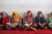 Des jeunes filles lisent le Coran, dans la province du Badakhshan, le 24 juillet 2024 en Afghanistan