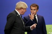 Le Premier ministre britannique Boris Johnson et le président français Emmanuel Macron pendant la COP26 à Glasgow, le 1er novembre 2021