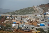 Un camp de déplacés syriens installé au pied du mur de la frontière turque, près du village de Kafr Lusin dans le nord d'Idleb, le 21 février 2020