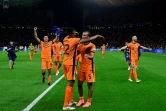 Les joueurs des Pays-Bas célèbrent leur qualification pour les demi-finales de l'Euro-2024 après leur victoire face à la Turquie (2-1), à Berlin en Allemagne, le 6 juillet 2024