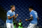 L'attaquant de la Lazio, Ciro Immobile (g), fête son but avec le milieu argentin Joaquin Correa lors du match de Serie A contre Brescia, à Rome, le 29 juillet 2020