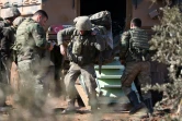 Des soldats turcs déployés au Mont Bersaya, au nord de la ville syrienne d'Azaz, lors de l'opération "Rameau d'olivier" contre les unités kurdes YPG, le 29 janvier 2018 
