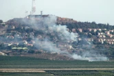 Photo prise au Sud-Liban de la fumée s'élevant de la ville israélienne de Metulla, après des tirs de roquettes transfrontaliers depuis le Liban, le 26 juin 2024