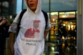 Une personne manifeste devant le tribunal de Chicago le 25 septembre 2018, le jour où Laquan McDonald aurait eu 21 ans