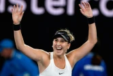La Suisse Belinda Bencic explose de joie après sa victoire sur Venus Williams au premier tour de l'Open d'Australie le 15 janvier 2018