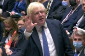 Image tirée d'une vidéo montrant le Premier ministre britannique Boris Johnson au Parlement, le 24 novembre 2021