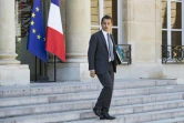 Le ministre français de l'Action et des Comptes publics Gérald Darmanin quitte le Conseil des ministres hebdomadaire au Palais de l'Elysée, à Paris, le 3 août 2018