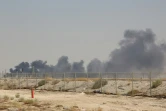 Après une attaque de drones, de la fumée s'élève au-dessus du site pétrolier d'Abqaiq du géant saoudien Aramco, à 60 km au sud-ouest de Dahran, dans l'est de l'Arabie saoudite, le 14 septembre 2019