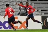 La joie de l'attaquant de Lille, l'Américain Timothy Weah, après avoir ouvert le score contre l'Ajax Amsterdam, lors de leur 16e de finale aller de la Ligue Europa, le 18 février 2021 à Villeneuve-d'Ascq 