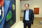 Michel-Edouard Leclerc, à la tête du Fonds Hélène et Edouard Leclerc, centre d'art contemporain de Landerneau, pose devant l'oeuvre de Marc Chagall "Le cirque bleu" à Landerneau, le 24 juin 2016