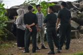 Des patrouilles de la police religieuse contrôlent un jeune couple sur la plage à Banda Aceh, le 10 décembre 2019 province indonésienne qui applique la charia