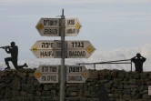 Des soldats israéliens avec en arrière plan le mont Bental sur la partie du plateau du Golan occupée par Israël, le 20 janvier 2019