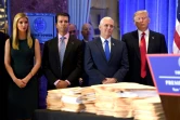 A la droite de Donald Trump, son vice-président, Mike Pence, son fils Donald Jr et sa fille sa fille Ivanka, le 11 janvier 2017 à New-York
