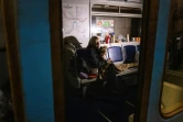 Une habitante de Kiev réfugiée dans le métro de la capitale ukrainienne pour se protéger des bombardements russes, le 19 mars 2022