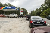 Des gens faisant la queue à une station essence à l'extérieur de la ville de Tallahassee, en Floride, à l'approche de l'ouragan Michael, le 8 octobre 2018.