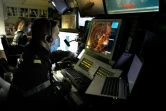 Des soldats de la Marine française travaillent au centre d?opérations de la frégate furtive La Fayette qui patrouille depuis trois mois en Méditerranée orientale, le 26 octobre 2020