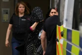 Une femme emmenée par la police à Barking, dans l'est de Londres, le 4 juin 2017