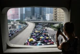 Des manifestants prodémocratie défilent avec des parapluies, symbole du grand mouvement de 2014, le 24 août 2019 à Hong Kong